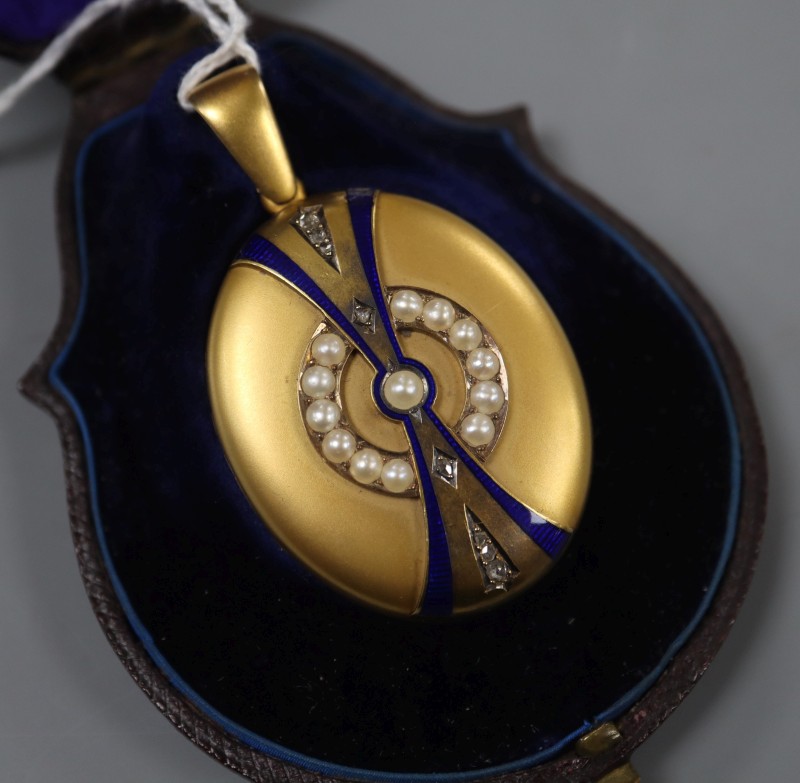 A Victorian yellow metal, diamond, enamel and split pearl set oval locket,